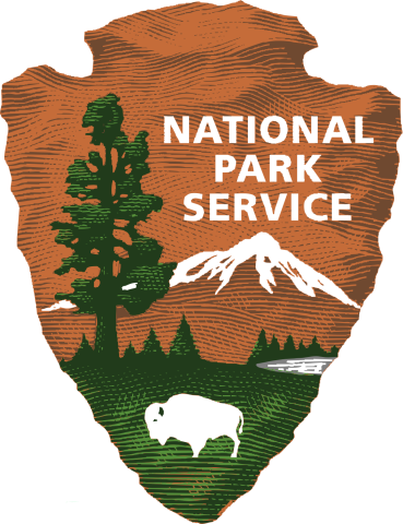 Logo of the United States National Park Service - brown arrow head with an outline of a mountain, tree and buffalo.