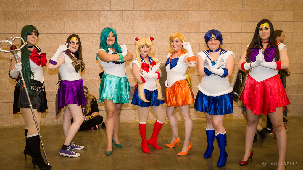 A group of cosplayers dressed as characters from the anime series "Sailor Moon"