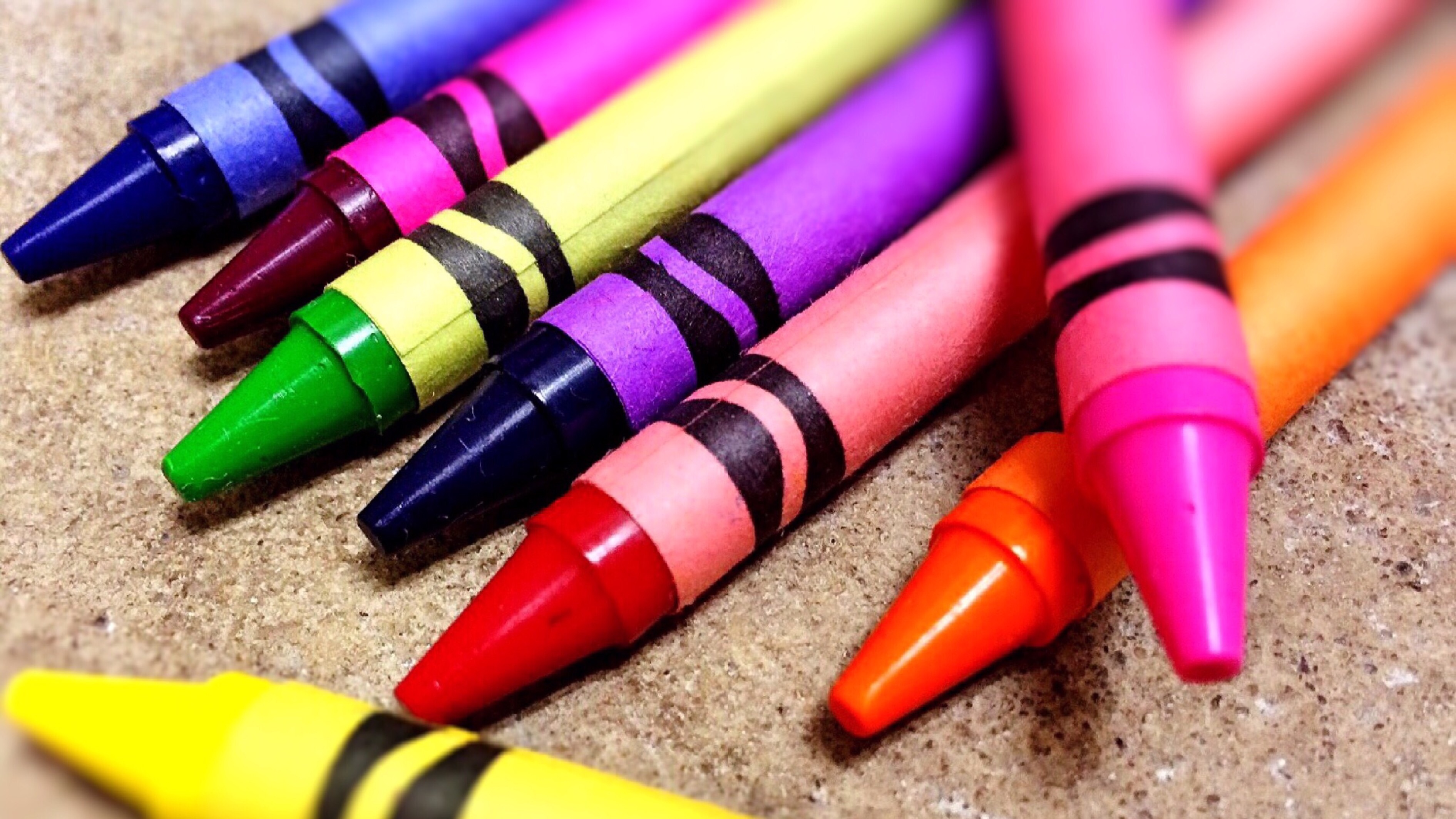 Crayons laying on table