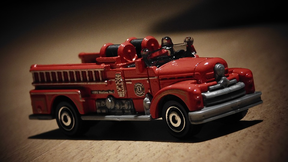 A small toy fire truck.