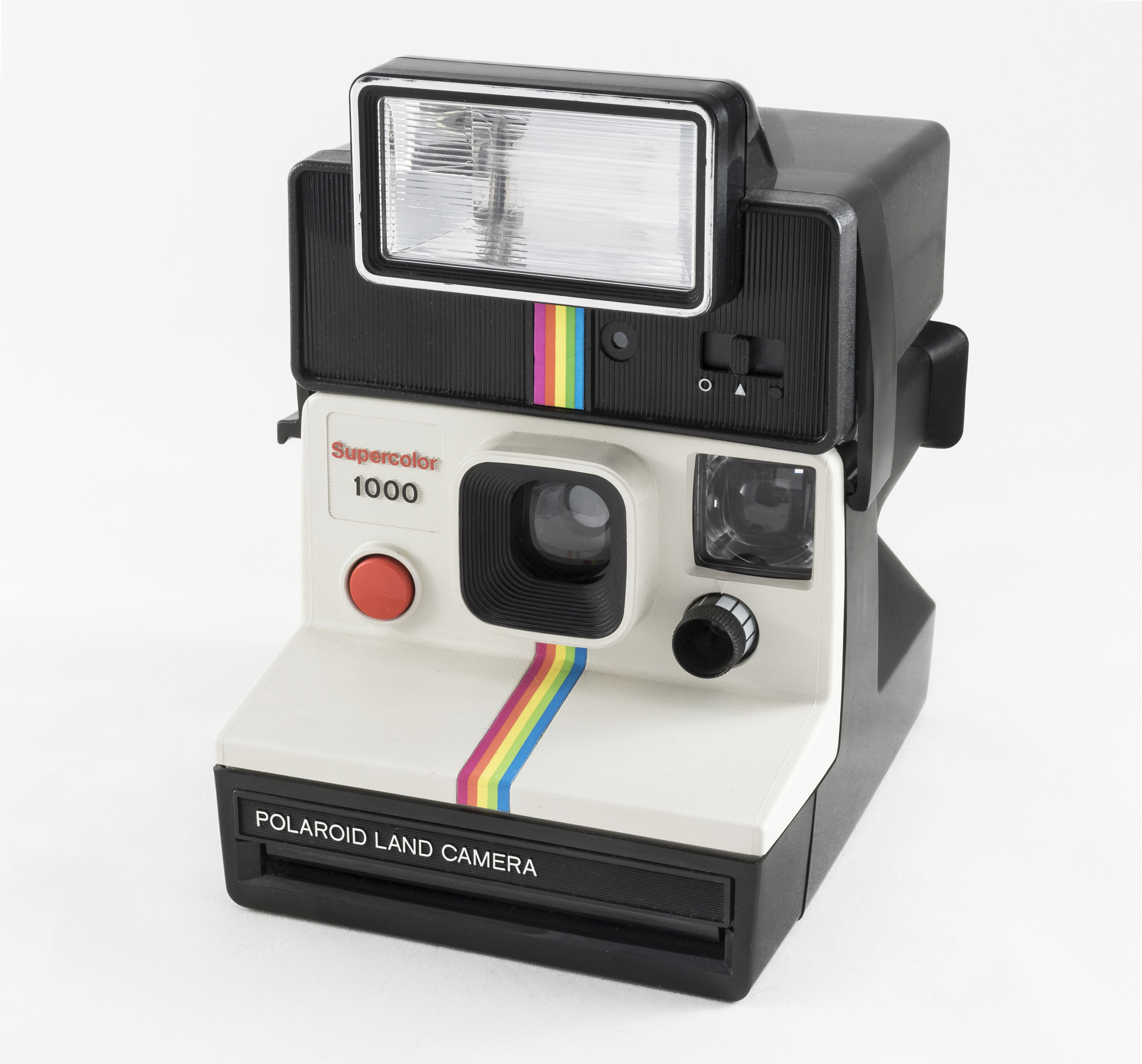 A picture of a polaroid camera on a white background.