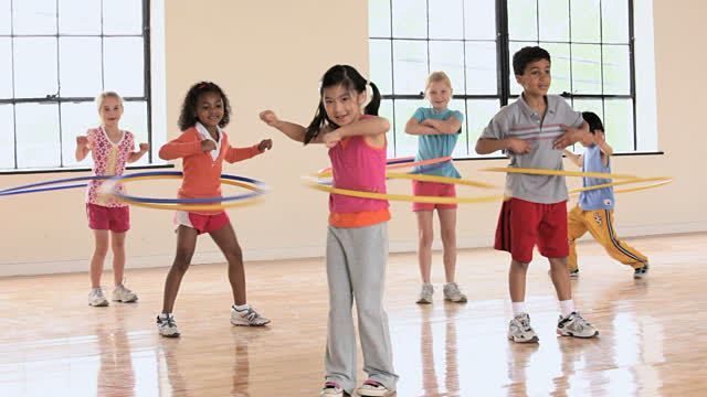 Children with hula-hoops
