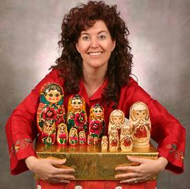 Lady in red shirt with a set of Matroyshka dolls