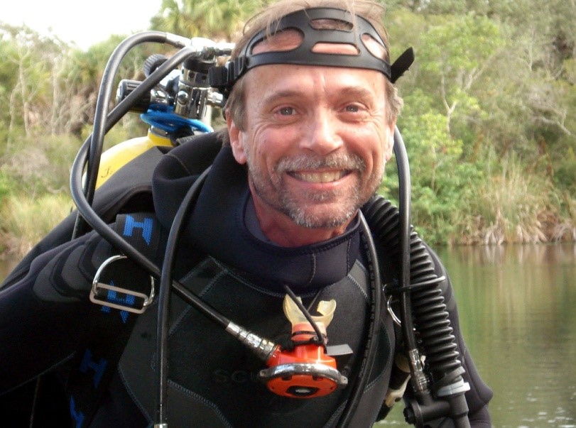 Picture of Steve Koski in black scuba gear. 