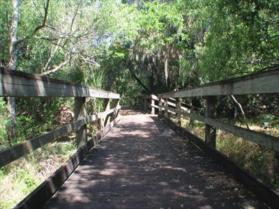 wooden bridge on walking trail
