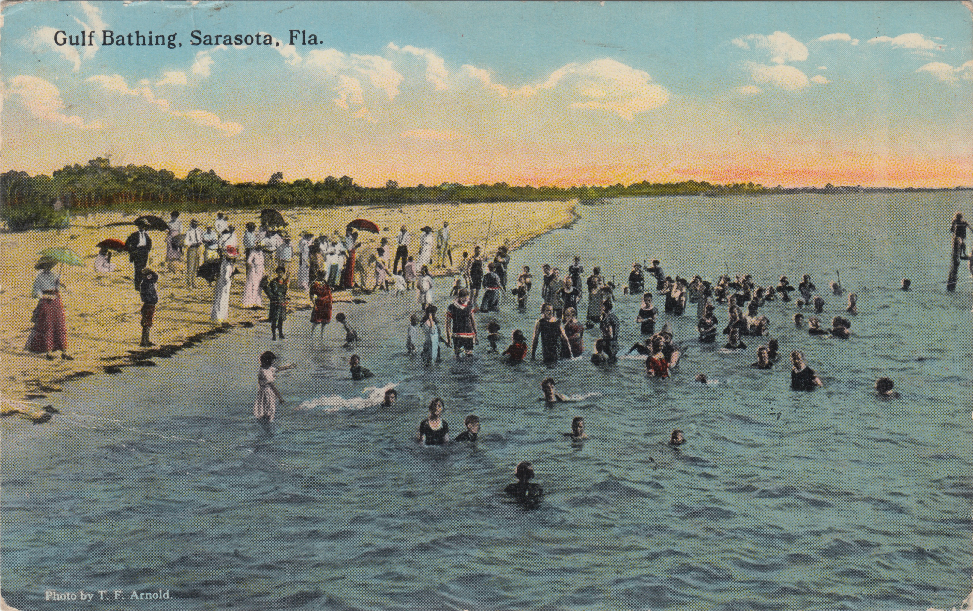 Vintage postcard of people on a beach in Sarasota