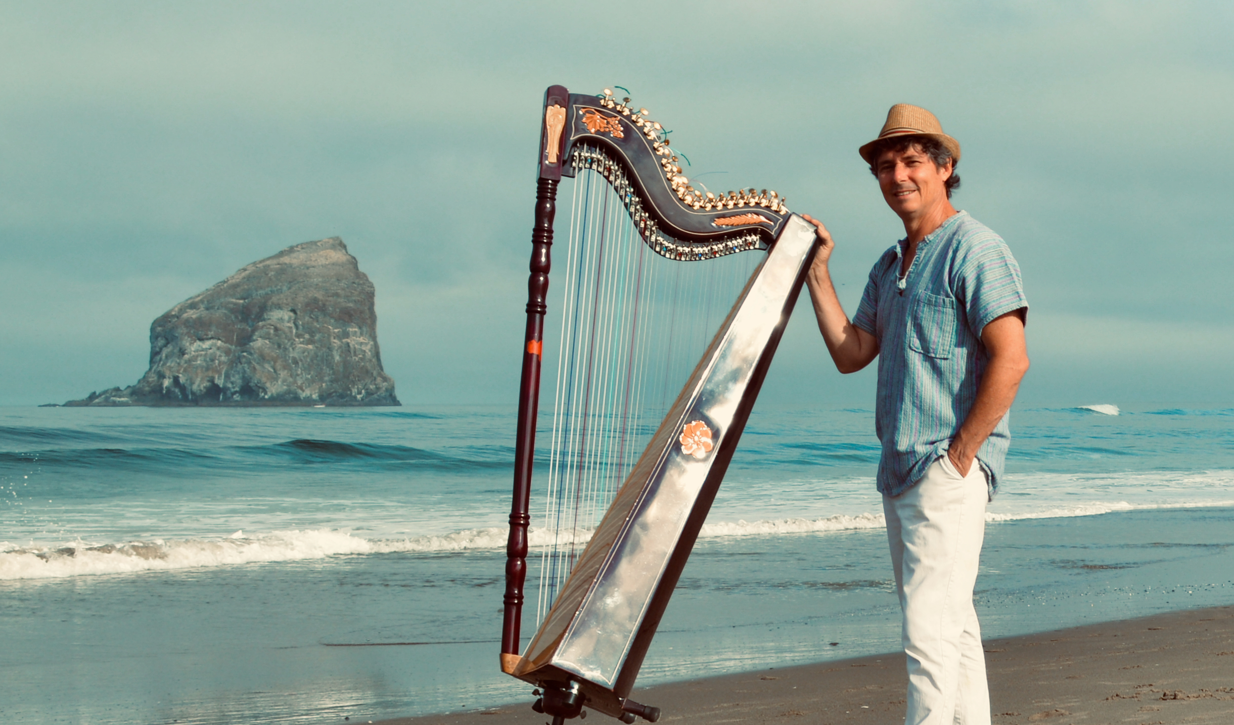 Nicolas Carter with harp.