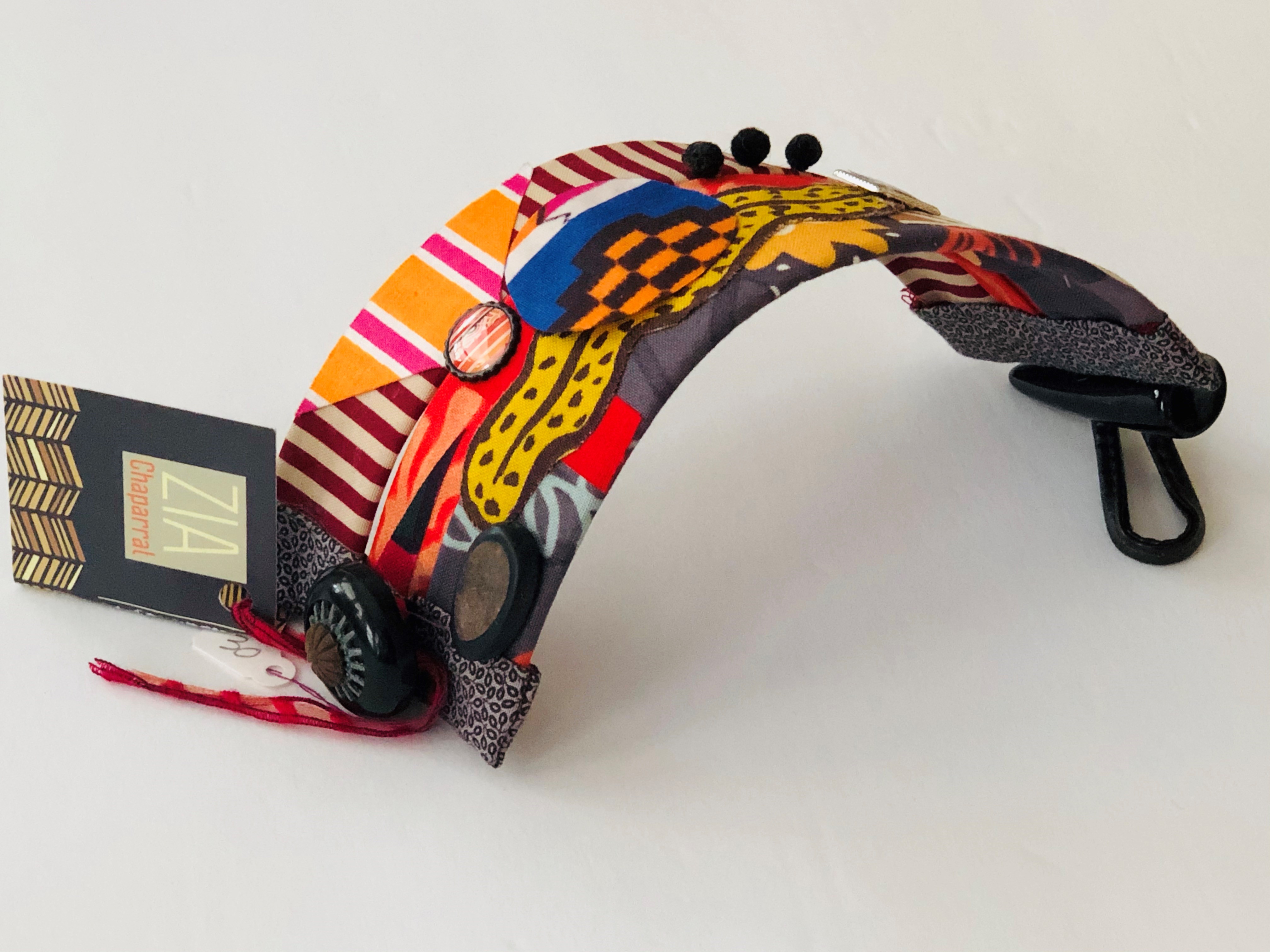Photo of a mixed fabric bracelet by Ellen Goldberg
