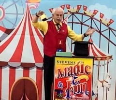 Dick Stevens performing a magic show