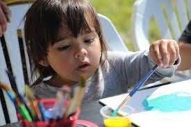 Child creating art piece