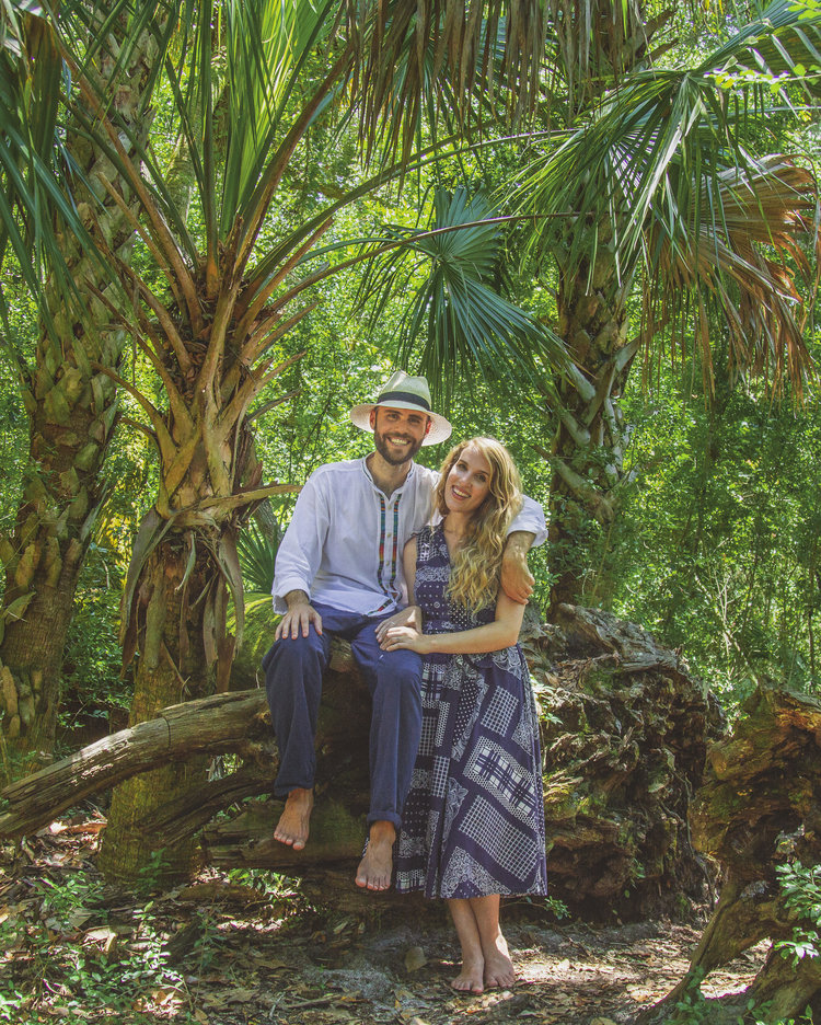 Picture of Evan and Vanessa standing in the jungle.