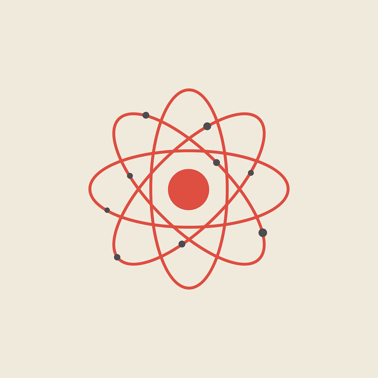 An image of a red atom with black dots.