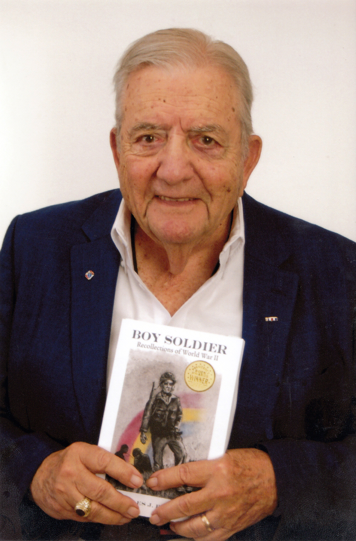 Charles Palmeri with his book Boy Soldier