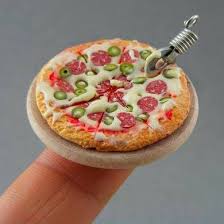 A mini pizza with pepperoni