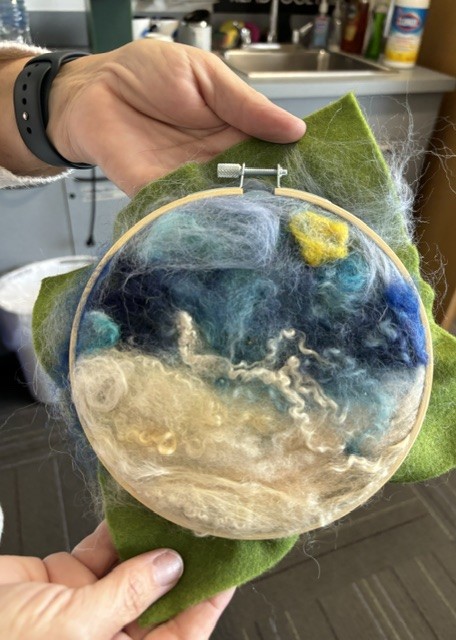 embroidery hoop with needle felt creation