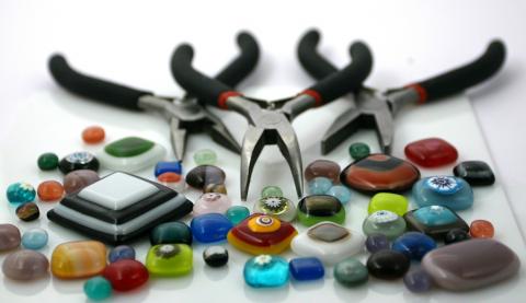 Jewelry making tools and colorful stones