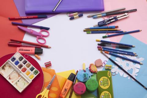 Colorful art supplies laying on a table