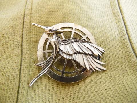 Mockingjay pin from The Hunger Games