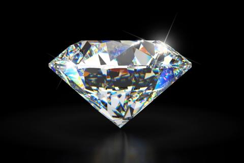 Close up picture of a brilliant-cut diamond gemstone.