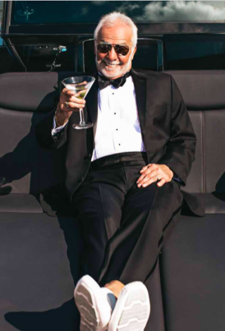 Photo of Captain Lee in a Tux with a Martini