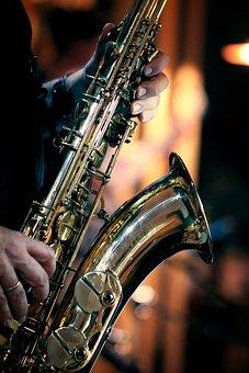 person playing the saxaphone