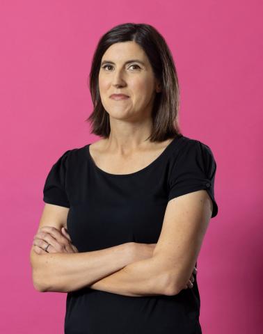 A photo of author Curtis Sittenfeld. She is a dark haired, fair skinned woman wearing a black tee shirt.