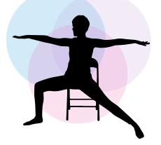 Silhouette of person in a chair in a yoga pose.