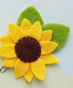 Sunflower bookmark made from felt material with green leaves