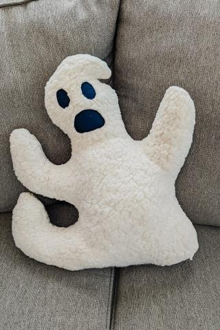 Photo of a handmade ghost pillow.