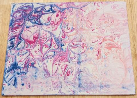 Photo of a shaving cream marbled artwork.