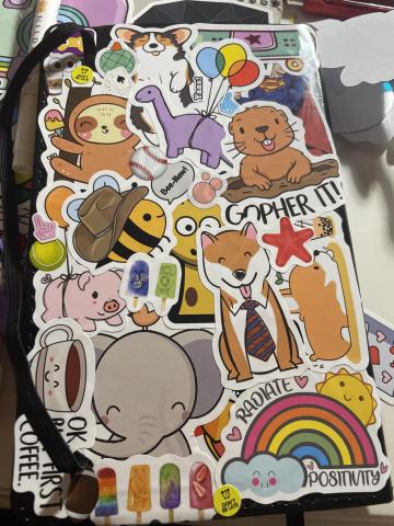 A notebook plastered with stickers