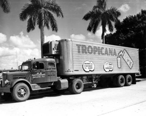 A Tropicana truck in Bradenton is parked while being loaded with oranges. 