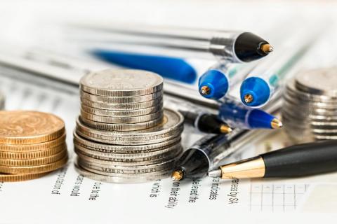 Image of coins and pens