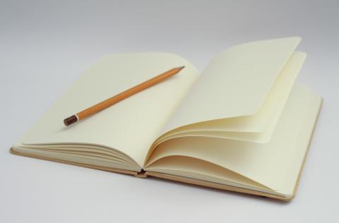 Blank notebook with pencil 
