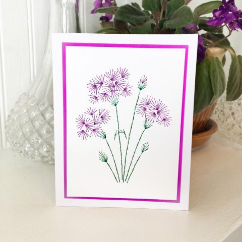 embroidered flowers on a card