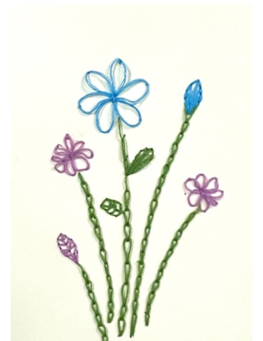 Blue and purple sewn flowers on cream colored paper.