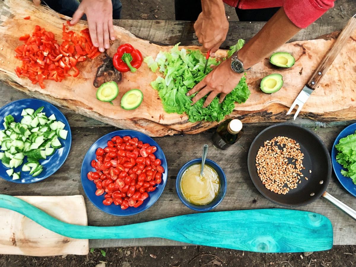 Cutting Board with salad ingredients