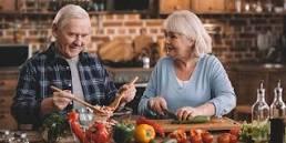 senior couple eating salad