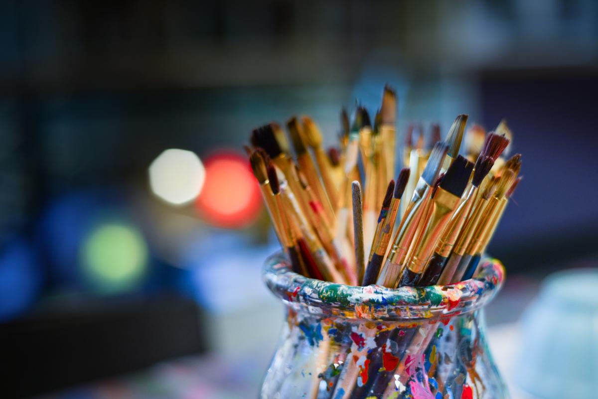 paint brushes in a jar