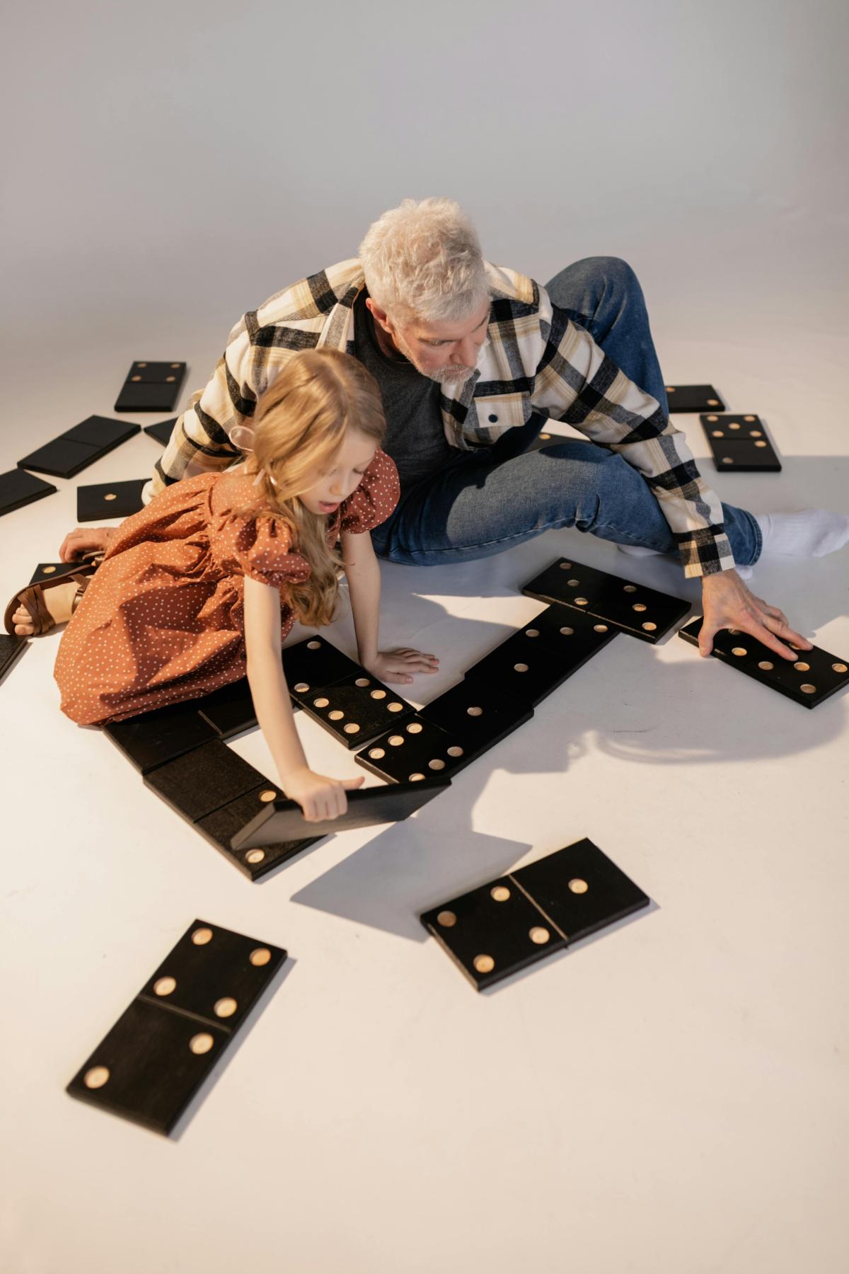 family playing giant dominoes