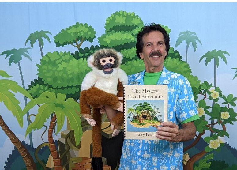 Man with a monkey puppet.