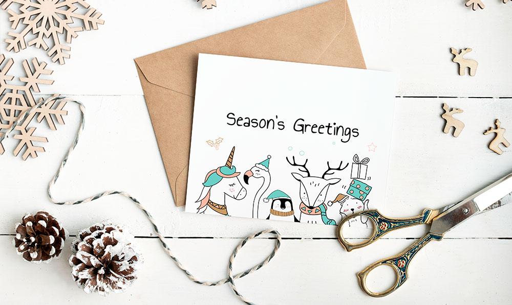 Card next to holiday decorations