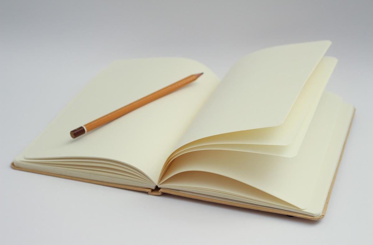 Blank notebook with pencil 
