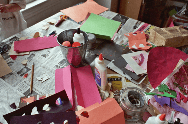 Art supplies scattered across a table