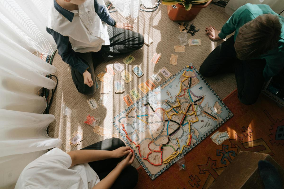 people playing board games