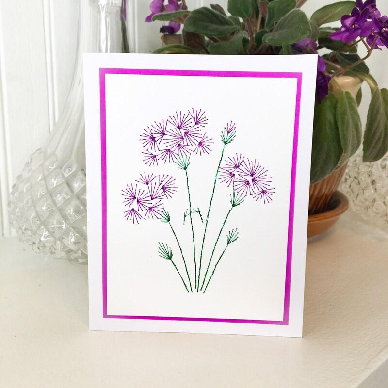 embroidered flowers on a card